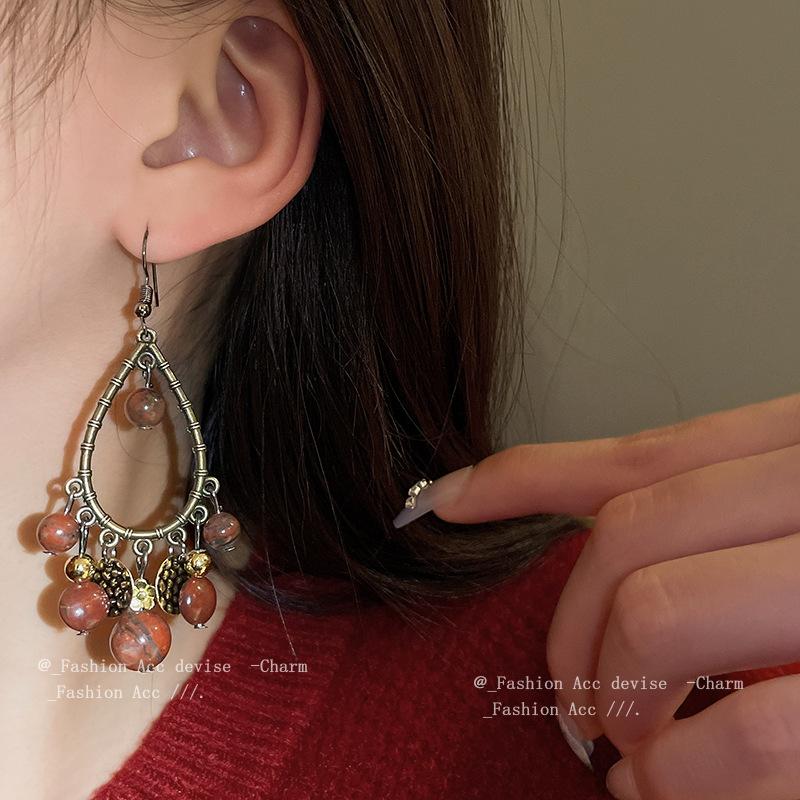 Water drop tassel earrings New Chinese retro temperament High-end ear hook Niche fashion design earrings Women