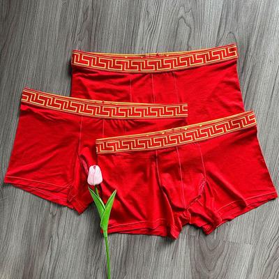 Leuchtend rote Herren-Boxershorts: Erfrischender Separationsstil, Atmungsaktive Hodensackunterstützung, Flaches Beindesign