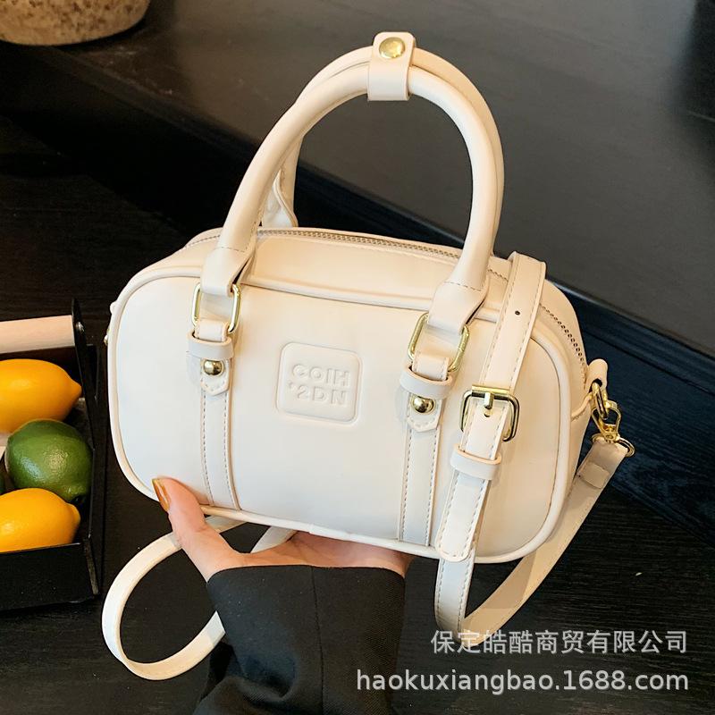 Korean version niche design fashionable versatile portable pillow bag women's 2025 summer new high-end Boston bag