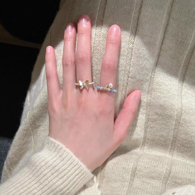 Chic French Style Butterfly Camellia Pearl Ring For Women With Unique Fashionable Appeal And Adjustable Fit