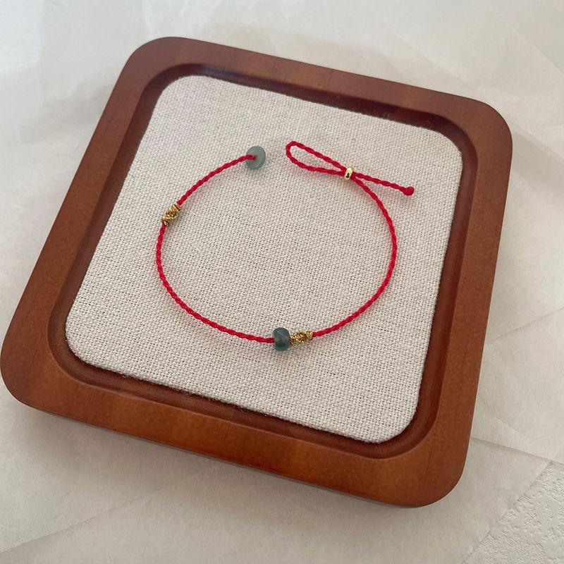 

Оригинальный ультратонкий плетеный вручную из натурального а карго нефрита, браслет-оберег с бусинами на удачу, красная титановая нить на запястье для женщин Red Jade transfer beads hand circumference 14-15cm