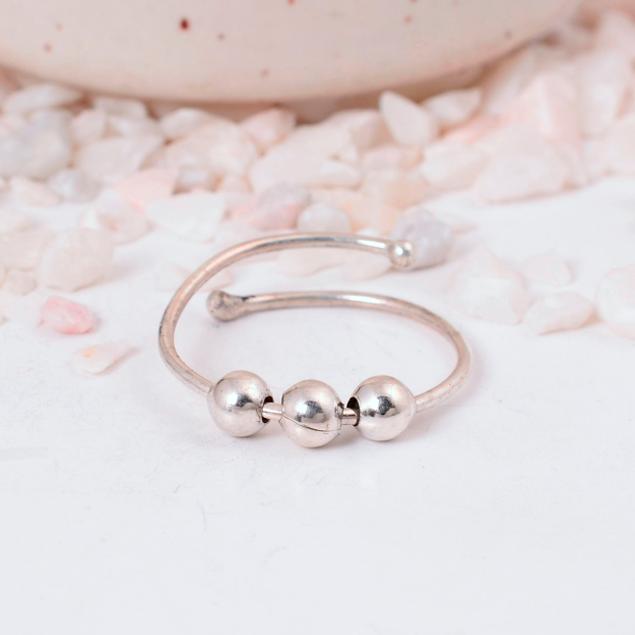 Adjustable Silver Fidget Ring: Minimalist anxiety jewelry with three movable spinner beads and a simple open wrap design.