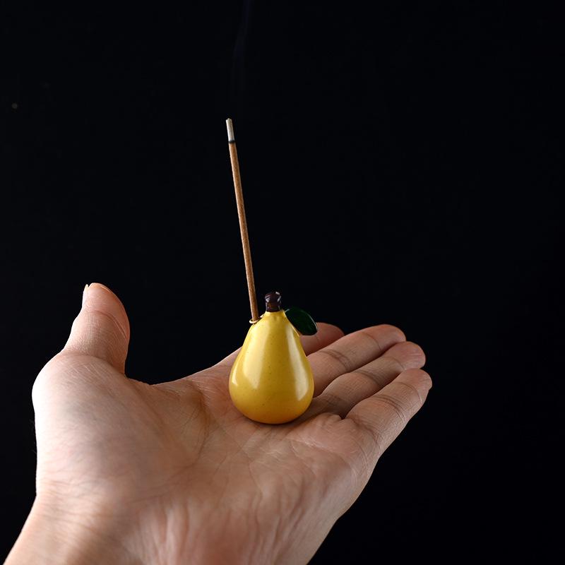 

Ceramic Duck Pear Incense Holder - Handmade Sandalwood Burner, Decorative Fruit Ornament for Home.