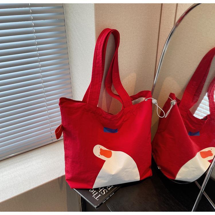 

Canvas bag women s large-capacity new summer casual versatile shoulder drawstring bag college student tote bag бордовий