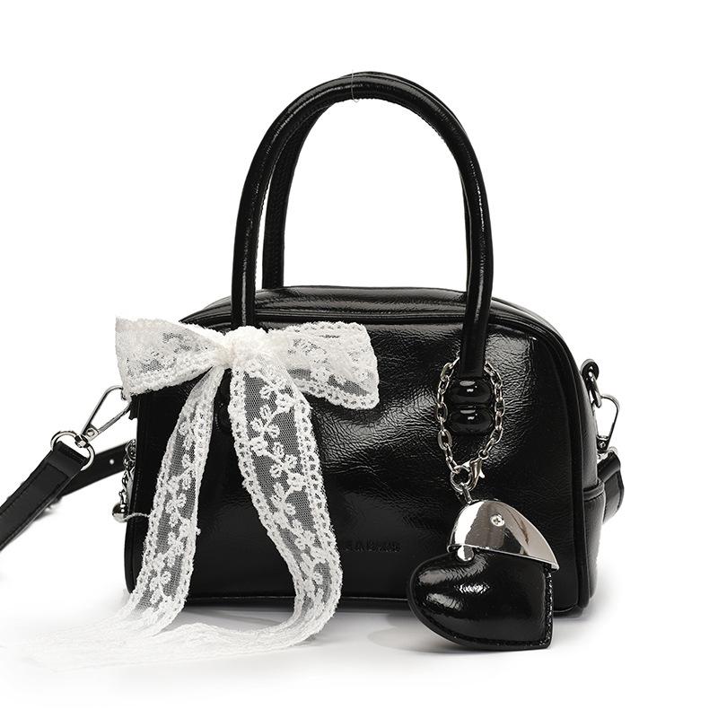 Korean version of the hot sale niche simple solid color hand pillow bag versatile fashion high texture commuter messenger bag women