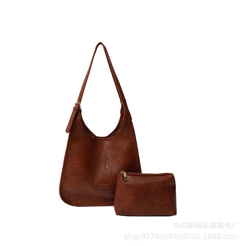 Large Capacity Retro Tote Mother and Child Bag Women's Bag 2025 New Fashion Explosion Shoulder Bag Commuter Armpit Bag