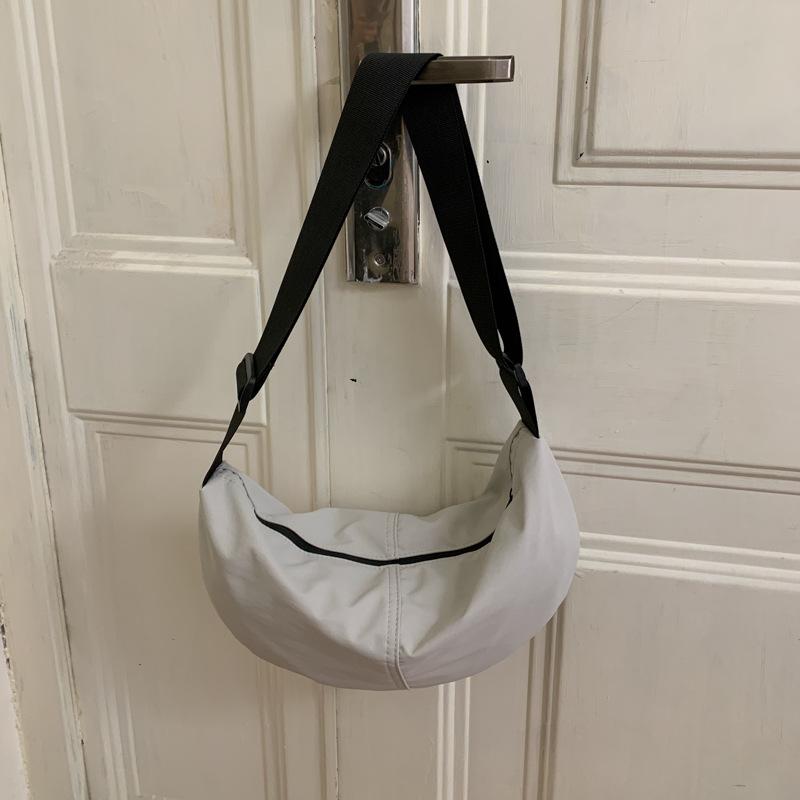 

Autumn and winter nylon bag women s casual bag wide shoulder strap single shoulder messenger bag simple and lightweight crescent bag белый