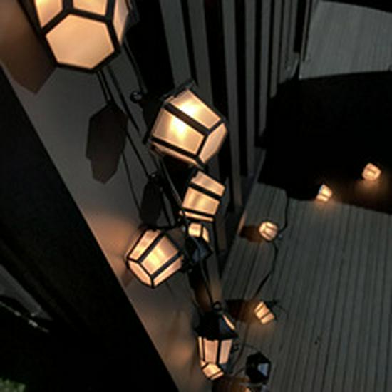 Low-Voltage Dark Green Wire Twinkling Star Fairy Lights - Outdoor Christmas LED String Lights for Courtyard Decoration.