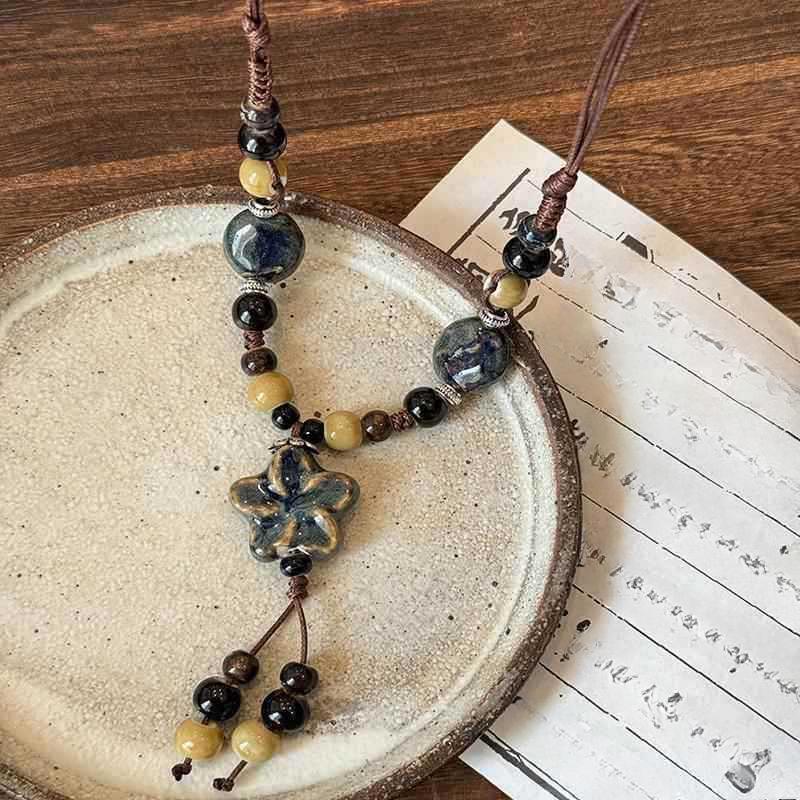 Long fringed ceramic flower necklace, retro high-end ethnic style beaded sweater chain