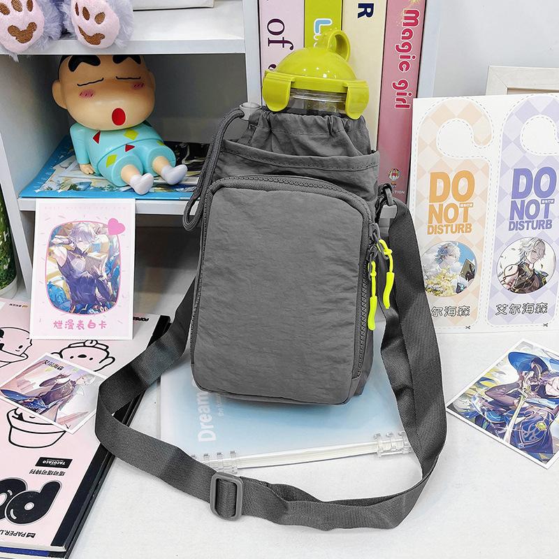 

New water cup bag casual shoulder bag kettle bag sports yoga outdoor mountaineering men s and women s nylon waterproof messenger bag серый