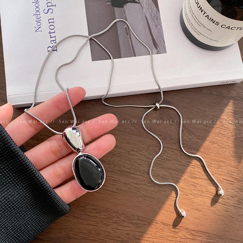 Water drop pendant titanium steel snake bone chain women s autumn and winter long pull-up sweater chain 2026 accessories