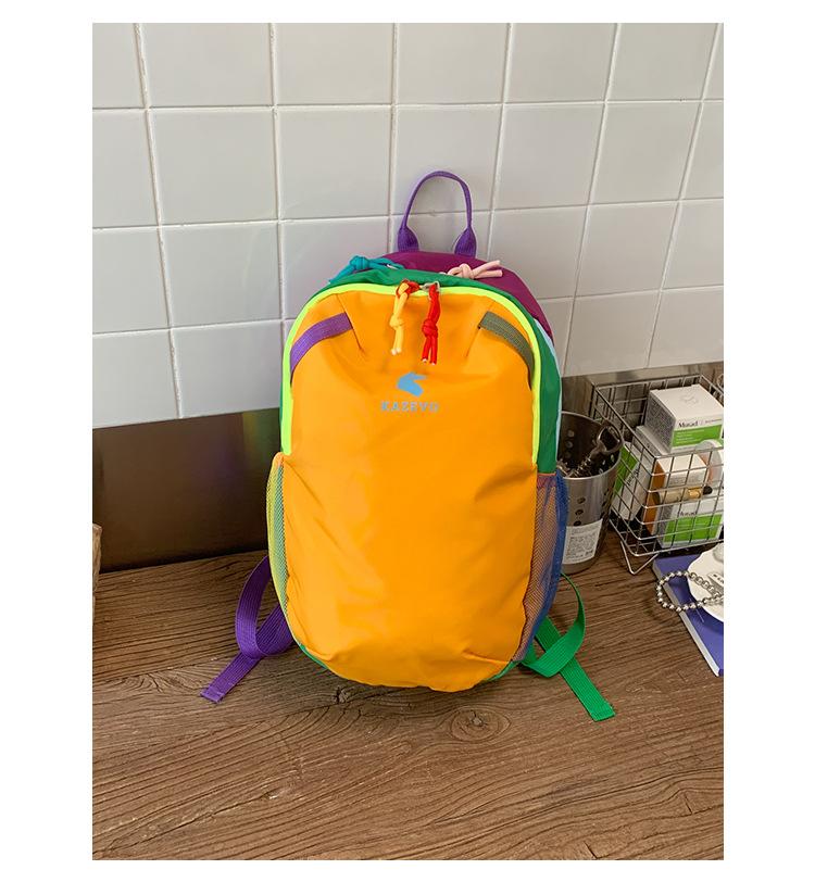 Zaino nuovo portatile colore a contrasto dopamina stile antivento anti-schizzi zaino da viaggio studente classe zaino da esterno per uomo e donna
