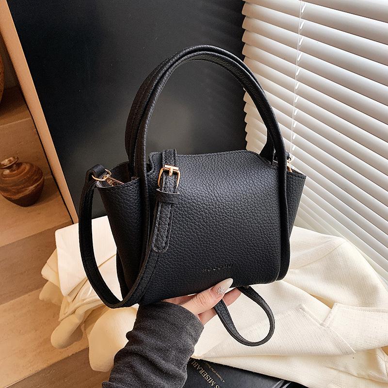 Spring women's bag niche high-end handbag 2025 new simple vegetable basket bag versatile shoulder messenger bag