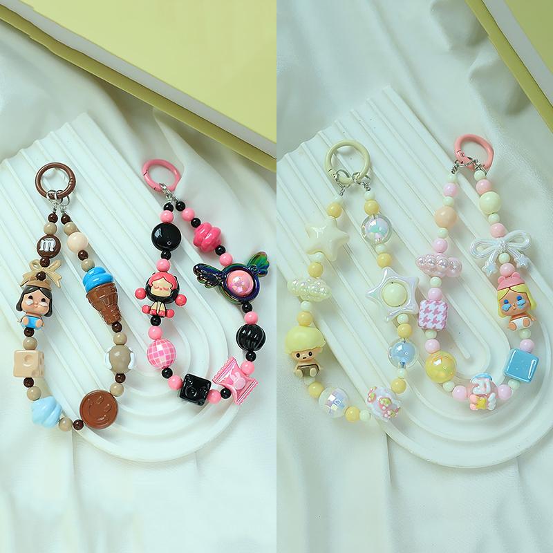 Roztomilá kreslená panenka s korálkovým popruhem na telefon, řetízkem na batoh, přívěskem na klíče, přívěskem proti ztracenému telefonu, dárkem pro iPhone, Samsung a dívku