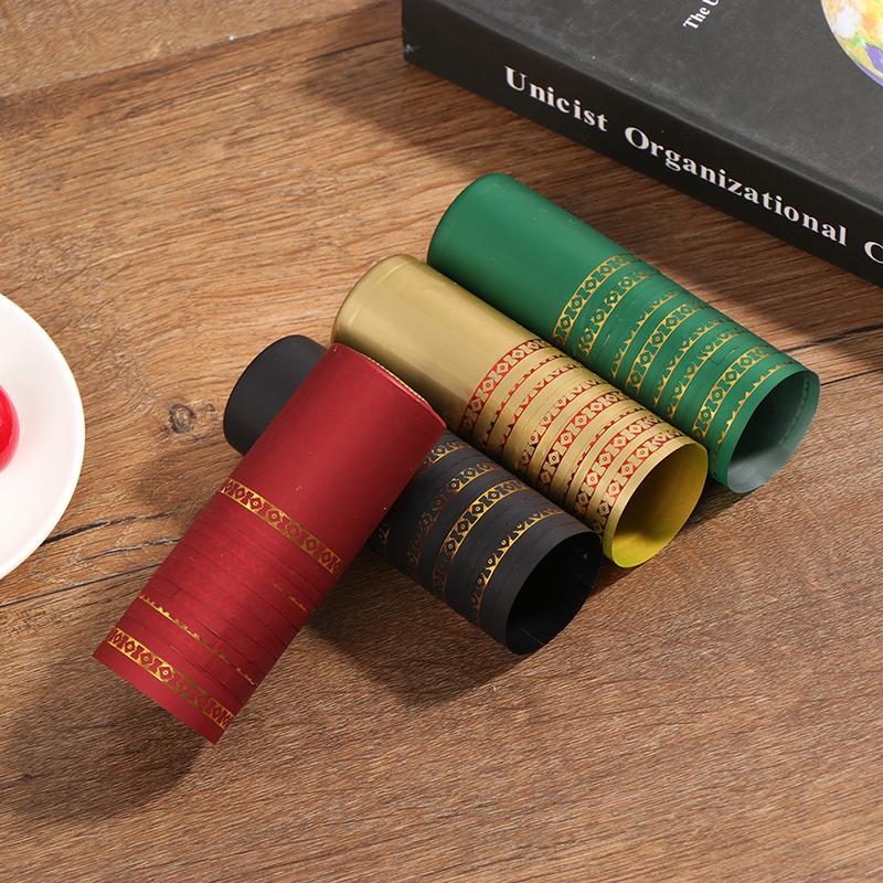 Smršťovací fólie, láhev s čajovým olejem, PVC těsnicí fólie, plastový obal