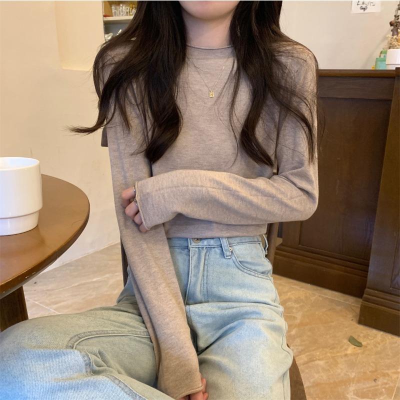 Lazy wind crimped knitted sweater women's early spring simple fashion long-sleeved inner top bottoming shirt