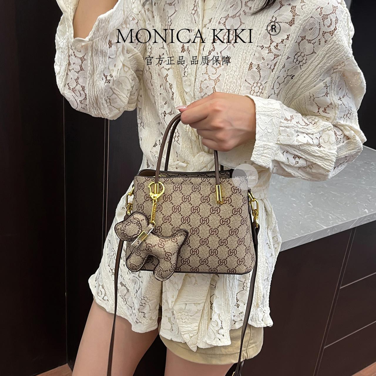 

Monica Qiqi s new retro printed handbag is simple and high-quality women s shoulder bag, French tote bag. серый