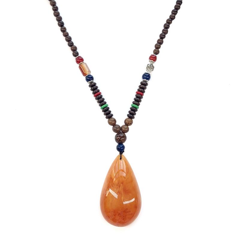Retro chicken wing wood second generation old beeswax necklace men and women versatile amber pendant long sweater chain pendant