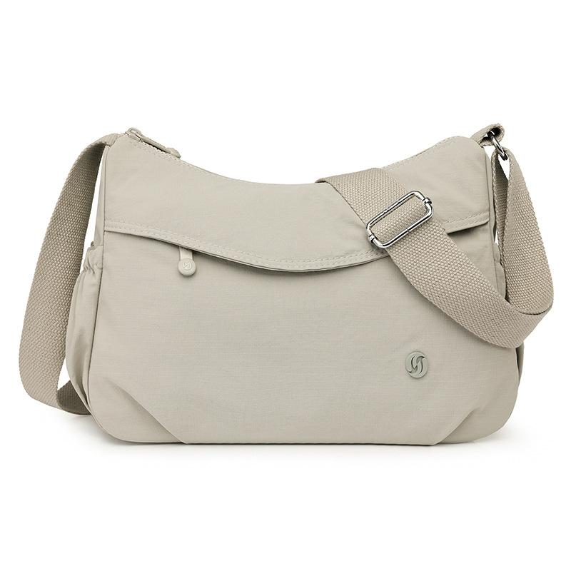

Oblique span bag women s large-capacity fashion casual versatile high-end sense niche lightweight shoulder bag серый