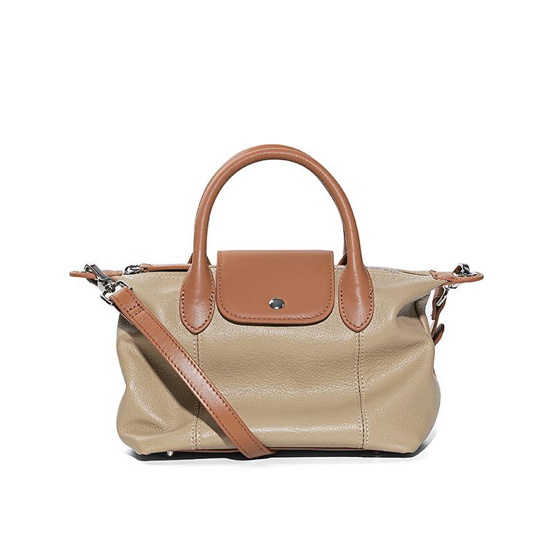 The first layer of cowhide fashion dumpling bag, versatile leather high-end color contrast large-capacity handbag women