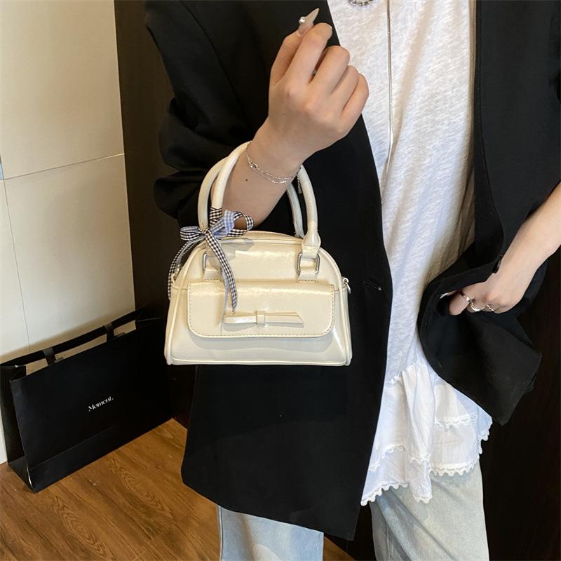 New women's bags trendy and versatile solid color small shell bags portable shoulder oblique span bags