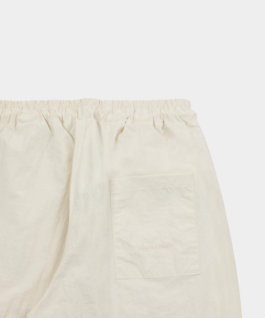 SLOW RECORD HOUSE Nylon One-Pleat Pants_Cream