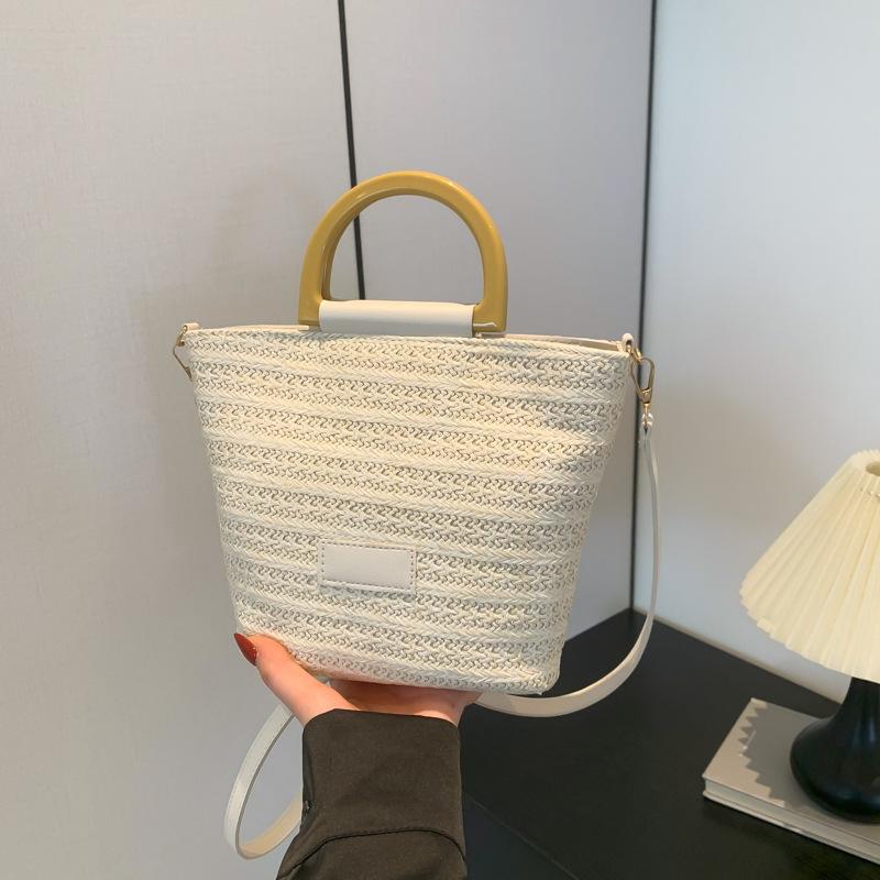 Beach woven contrasting color bucket bag women's 2025 summer new casual handbag fashion trendy shoulder messenger bag
