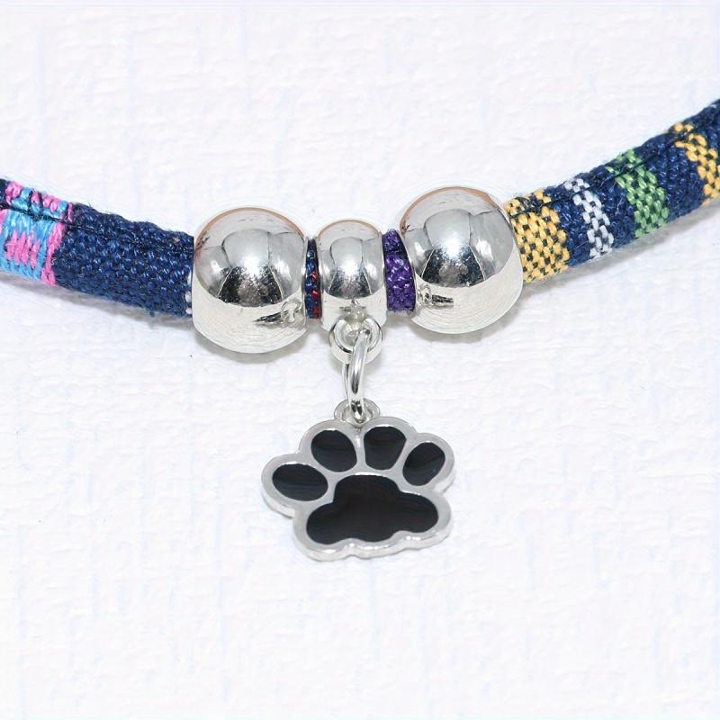 Haustierhalskette aus Nylon mit buntem Pfotenabdruck-Anhänger, verstellbares Halsband für Katzen und kleine Hunde mit ethnischem Design, stilvolles Haustier-Accessoire