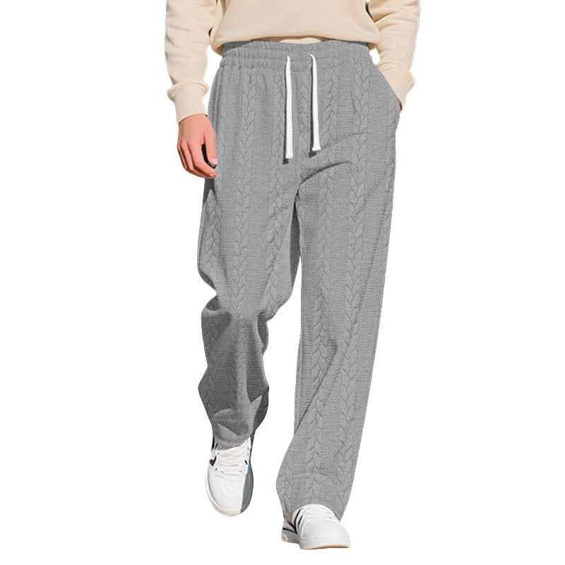 

New autumn and winter men s leisure sports solid color jacquard twist pattern large size drawstring trousers men XXXL светло-серый
