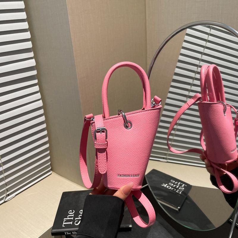Niche design fashionable versatile hand bag women's summer new simple retro messenger bucket bag
