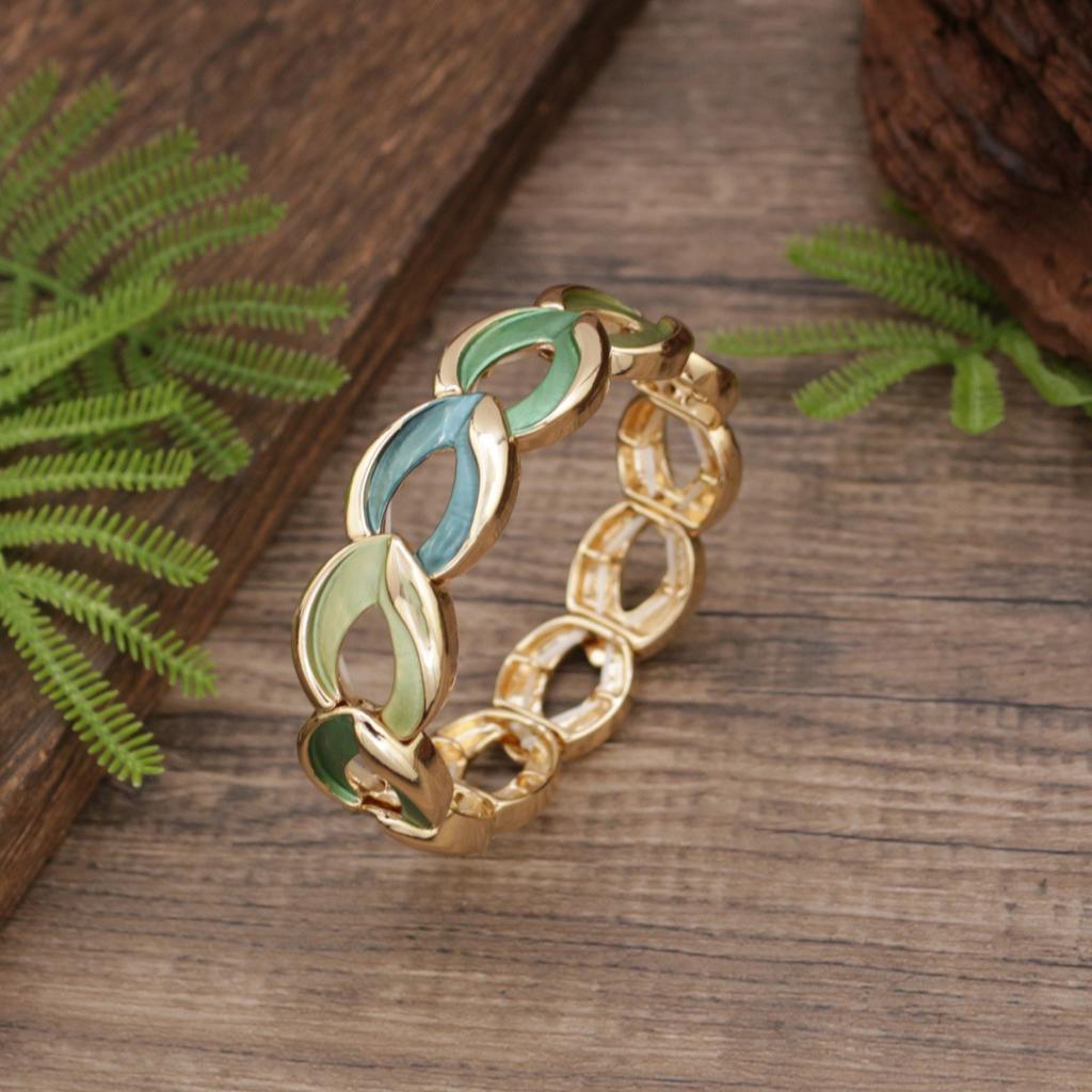 New enamel color hollow water drop elastic bracelet, women's simple and advanced water drop-shaped alloy bracelet