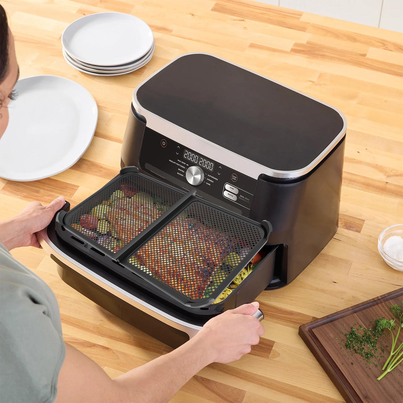 

Силиконовый защитный чехол от брызг для аэрофритюрницы безопасный, прочный и не деформируется. Защищает нагревательный элемент и вентилятор для Ninja AF500EU black 1PC