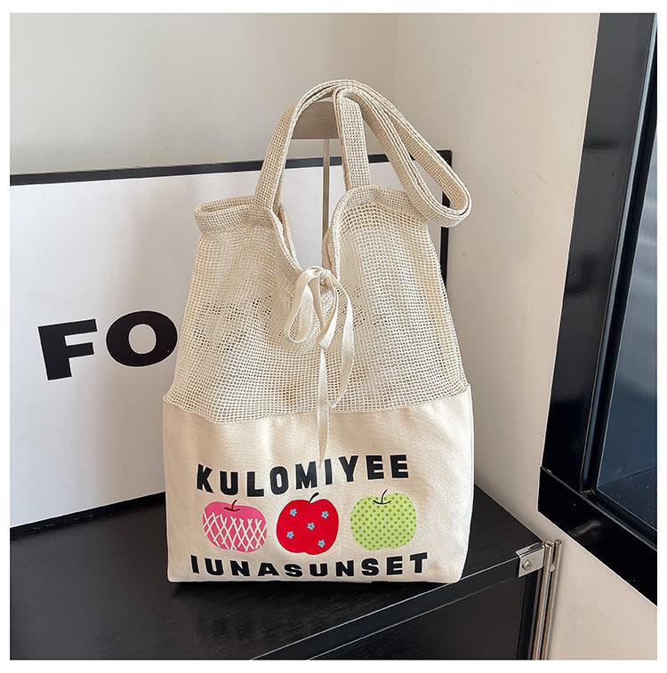 Neue bedruckte Netzstofftasche mit Stoffeinsätzen, frische und vielseitige Mädchen-Schultertasche, modische Einkaufstasche mit großem Fassungsvermögen