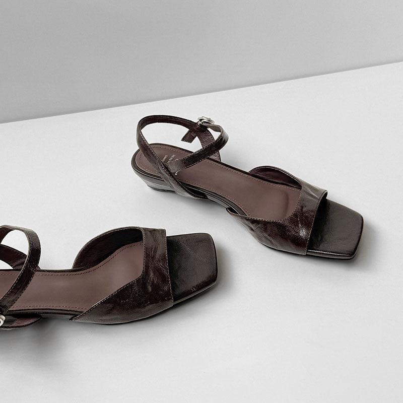 

The first layer of sheepskin super soft temperament French sandals women s 2025 small wedge heel commuter middle heel with Roman sandals 39