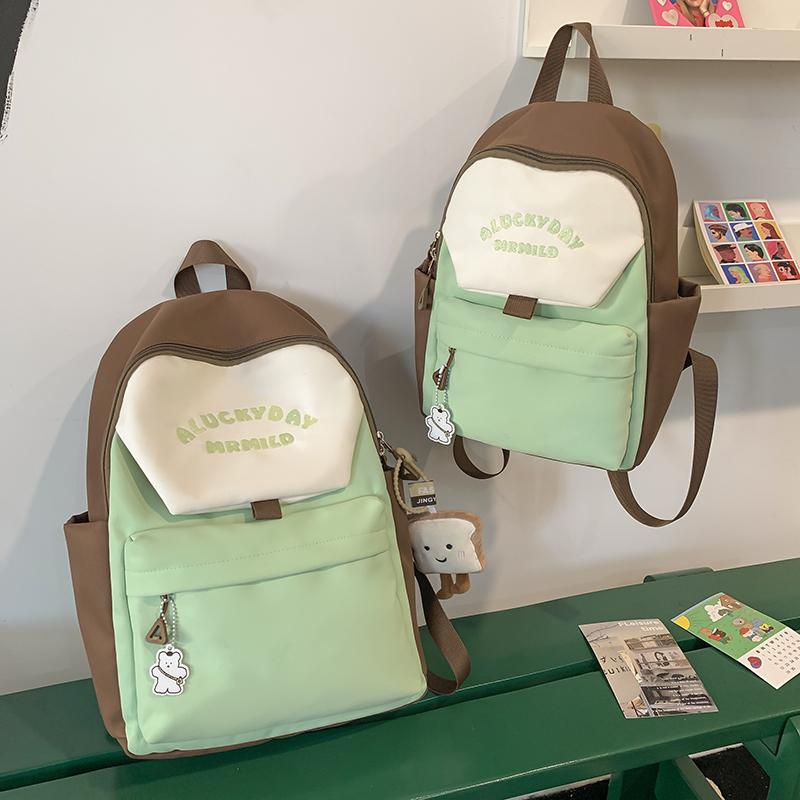 Женский рюкзак большой вместимости с цветными блоками для путешествий — фото 14