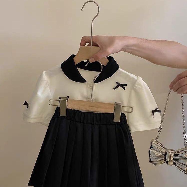 Conjunto Preppy de 2 Piezas para Bebé Niña Verano Top de Manga Corta con Lazo y Falda Plisada Atuendo de Moda para Niños Pequeños