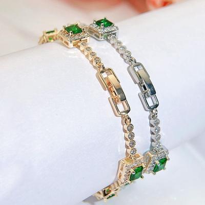 CMM Wunderschöner grüner Zirkonia, silbrig vergoldet, modisch, quadratisch, Charm-Gliederarmbänder für Damen