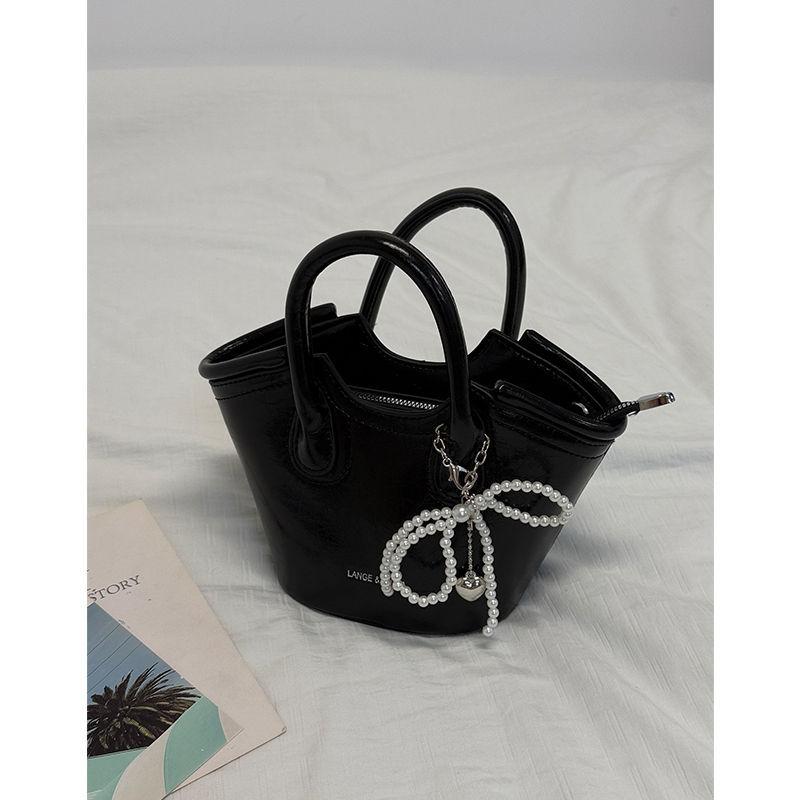 Premium sense light luxury vegetable basket bag women 2025 new niche design portable bucket foreign style messenger bag