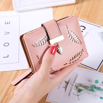 New Korean Version of the Short Wallet Lady Zipper Buckle Hollow Leaves Small Wallet Wallet Card Package Factory .