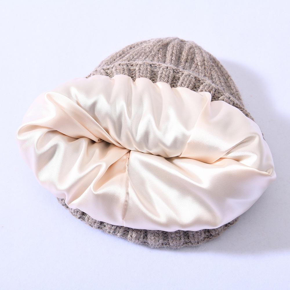 Versatile series big children's rabbit down knitted hat solid color lined outdoor satin lining wool hat warm ear protection