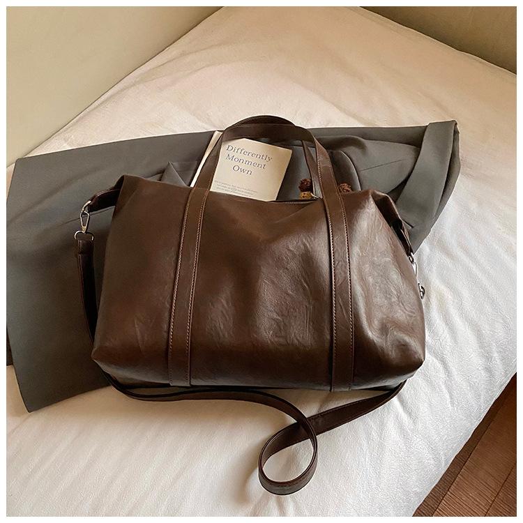 

Fashion design sense niche tote bag women s bag 2025 new retro versatile large capacity shoulder messenger bag