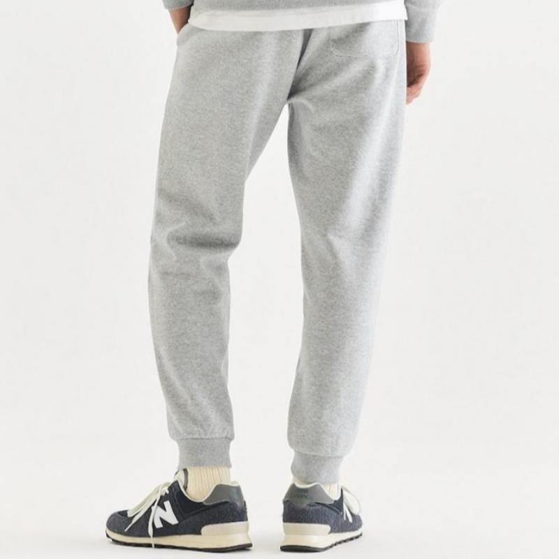 New Balance Spodnie dresowe Uni Essential Brushed Nbmld41013 Ac