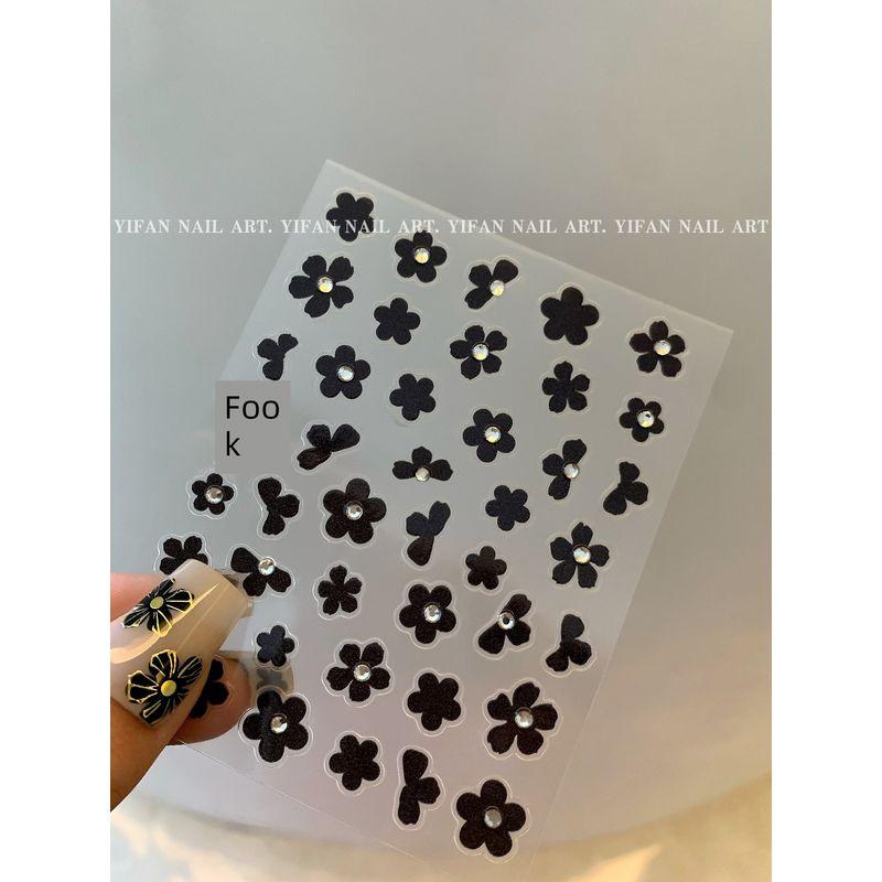 

Yifannail [Black and White Color Matching] Sweet Cool Little Black Flower Classic Style Black Camellia Nail Sticker J191 J191-1. [Black Flower. 1]]