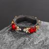 The Classic Black Ring Inlaid with Red Zircon Is A Fashion Ring