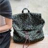 Tide and cool leopard print canvas backpack women's 2025 new casual large-capacity travel backpack female college student schoolbag