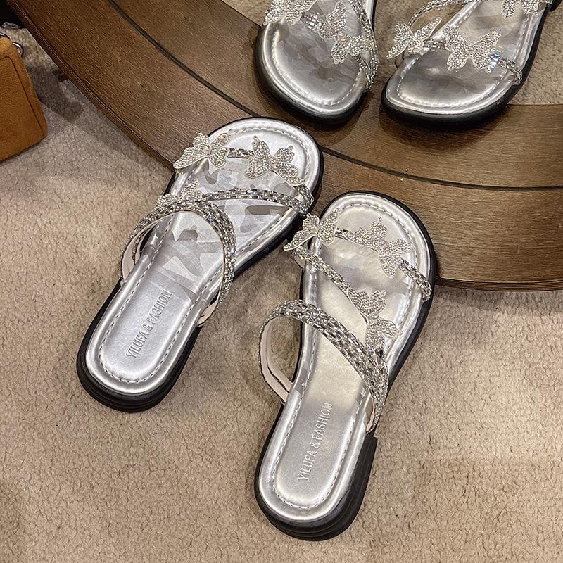 Wunderschöne Damen-Sommer-Slipper mit flachem Boden, 2025 neu, Internet-Berühmtheit, Explosion, Schmetterling, Strass, mit Rock, zwei Tragevarianten, Sandalen