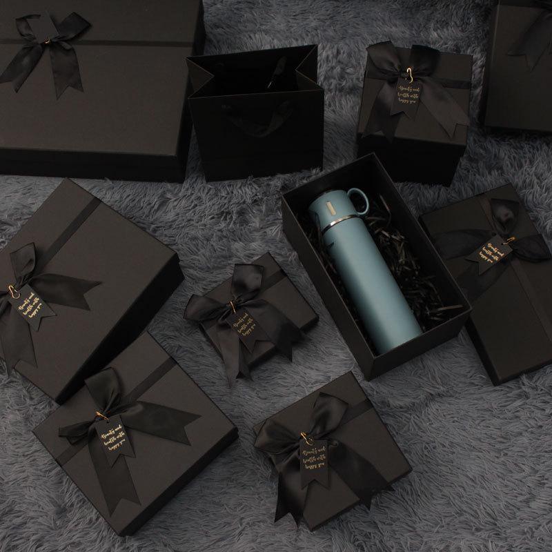 

Элегантная подарочная коробка чистого черного цвета с бантом – Большая изысканная упаковка для помады, обуви и праздничных сувениров Black Raffia Grass 20g