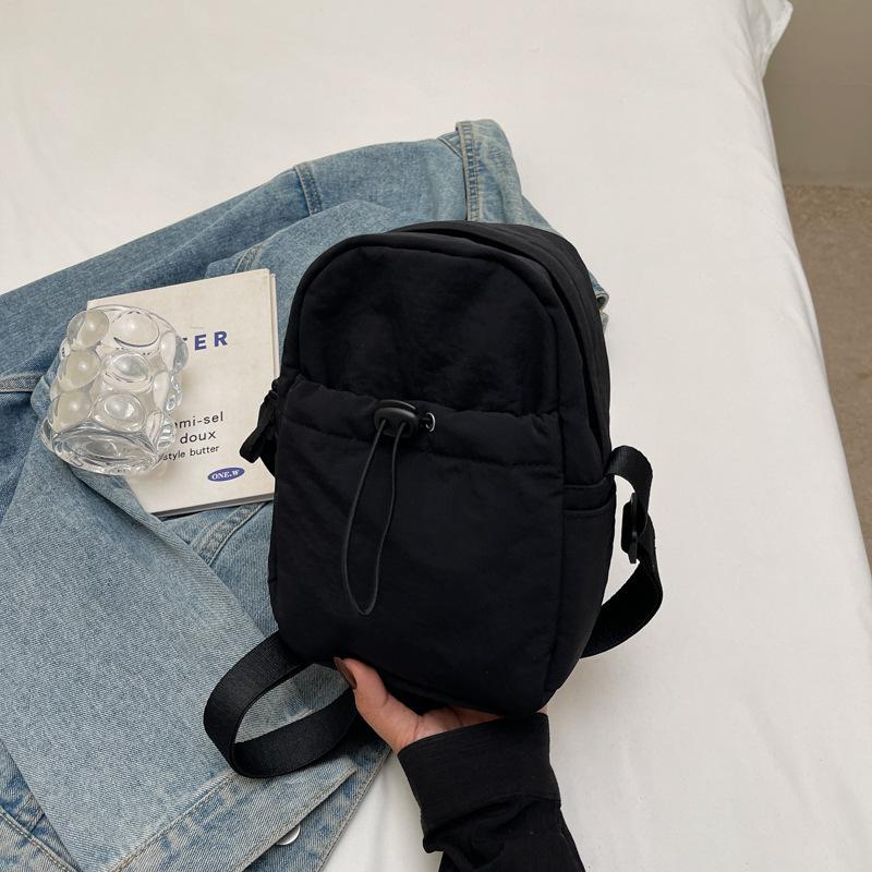 

Japanese solid color retro nylon cloth bag women s fashion new trendy simple mobile phone bag going out shoulder messenger bag