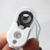 Tragbare 60X Handlupe Mini-Taschenmikroskop Lupe Währungserkennungsgerät Juwelierlupe Mit LED-Licht