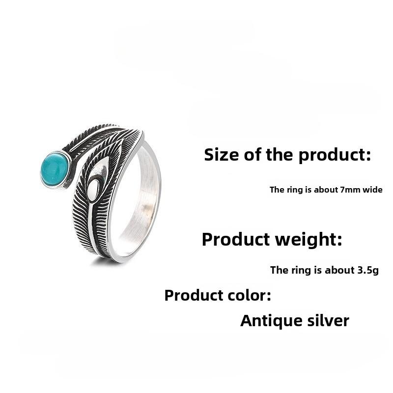 Vintage turquoise feather ring with adjustable opening.